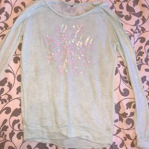 Long sleeve sweater with snowflake on it